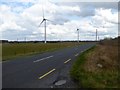 N1520 : Wind turbines near Gorteen Bridge by Oliver Dixon