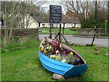 NZ1665 : Boat planter, Water Row, Newburn by Andrew Curtis