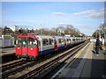 Eastbound train leaving Northfields station