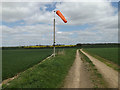 TM1257 : Windsock & footpath to Green Lane Farm by Geographer