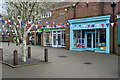 Shopfronts and bunting at The Furlong, Ringwood