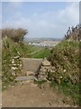 Stone stile and path to Bude Holiday Park