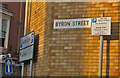 Byron Street and parking restriction signs