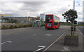 Red bus on Envoy Avenue