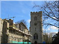 Building repairs in Market Place with the church of St Peter and St Paul in the background