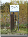 TM1853 : Manor Farm Fishing Lakes sign by Geographer