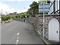 Castle Lane and a bench mark