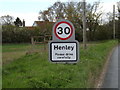 TM1550 : Henley Village Name sign on Main Road by Geographer