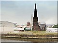 SJ4981 : Disused Church next to the Manchester Ship Canal at Weston Point by David Dixon
