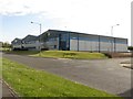 NZ2478 : Large sheds, Nelson Park West Industrial Estate, Cramlington by Graham Robson