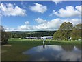 SK2570 : Chatsworth Horse Trials: view of main arenas from the Ice Pond by Jonathan Hutchins