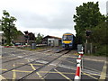 Train approaching Elmswell Level Crossing