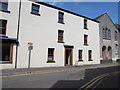 Irregular distribution of windows on a High Street building, Neath