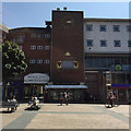 Brick panel with a balcony and a public clock, Broadgate, Coventry