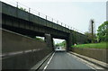 Rail bridge goes over the A37 at Stratton