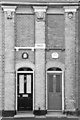 Southwold: front doors and faces in Victoria Street