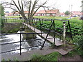 Footbridge across the Cod Beck in Thirsk