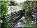 Footbridge across the Cod Beck in Thirsk