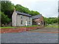 Stone built house and brick outbuilding