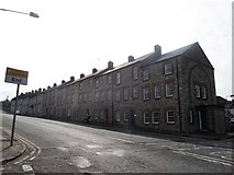 H8845 : Three- storeyed terraced housing on Barrack Hill by Eric Jones