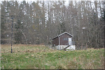 NH9645 : Ferness : Hut by Lewis Clarke