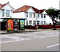 Adverts on a Caerphilly Road bus shelter, Cardiff 