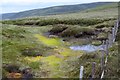 NT2026 : Peat bog pool, Redsike Head by Jim Barton