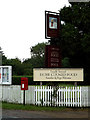 The Swan Inn Public House sign & Swan End Postbox