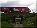 NZ2279 : Train crossing the railway bridge at Briery Hill by Graham Robson