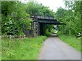 SK5468 : Dismantled railway and a railway bridge by Graham Hogg