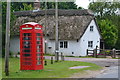Telephone box and thatched cottage at Norleywood
