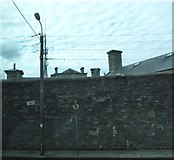 J0406 : The wall of the former Dundalk Gaol by Eric Jones