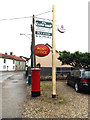 TL9986 : East Harling Post Office sign & Market Square Postbox by Geographer