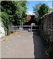 Metal barriers across a path to a railway underpass, Liswerry, Newport