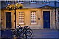 Lamplit house fronts in Kingsmead Square