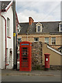 A Mosque, a telephone box and a post box