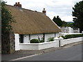 J0707 : Thatched farm house on the Point Road by Eric Jones