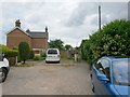 SZ0694 : Wallisdown: footpath U16 forms a wide driveway by Chris Downer