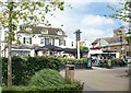 View of the Barmy Arms pub and St. Mary