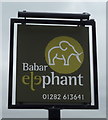 Sign for the Babar Elephant Indian Restaurant (closed)