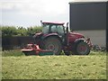 Tractor and mower at Mitford Steads