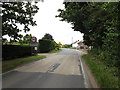 TL9979 : Entering the centre of Hopton on the B1111 Common Road by Geographer