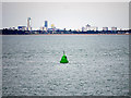 SZ5396 : The Solent, South Ryde Middle Marker Buoy and the Portsmouth Skyline by David Dixon