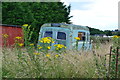 SP5371 : Retired ambulance in overgrown plot by the Oxford Canal by David Martin