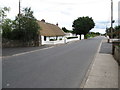 J0707 : The Point Road in the vicinity of the thatched roof farmstead on the Point Road by Eric Jones