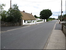 J0707 : The Point Road in the vicinity of the thatched roof farmstead on the Point Road by Eric Jones