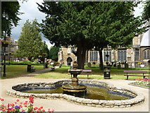 TF4609 : Fountain in the church gardens - Wisbech in Bloom 2016 by Richard Humphrey