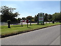 TM0587 : Grove Corner Postbox & Banham Zoo sign by Geographer