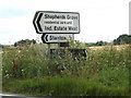 TL9773 : Roadsigns on the A143 Bury Road by Geographer