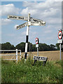 TM0888 : Roadsign & Mile Road sign by Geographer